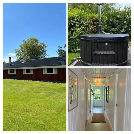 Dom wakacyjny Cozy With A Wilderness Hot Tub Nedre Lysabild